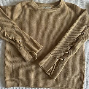 Tan knit sweater with pretty black detailing from T.J. Max